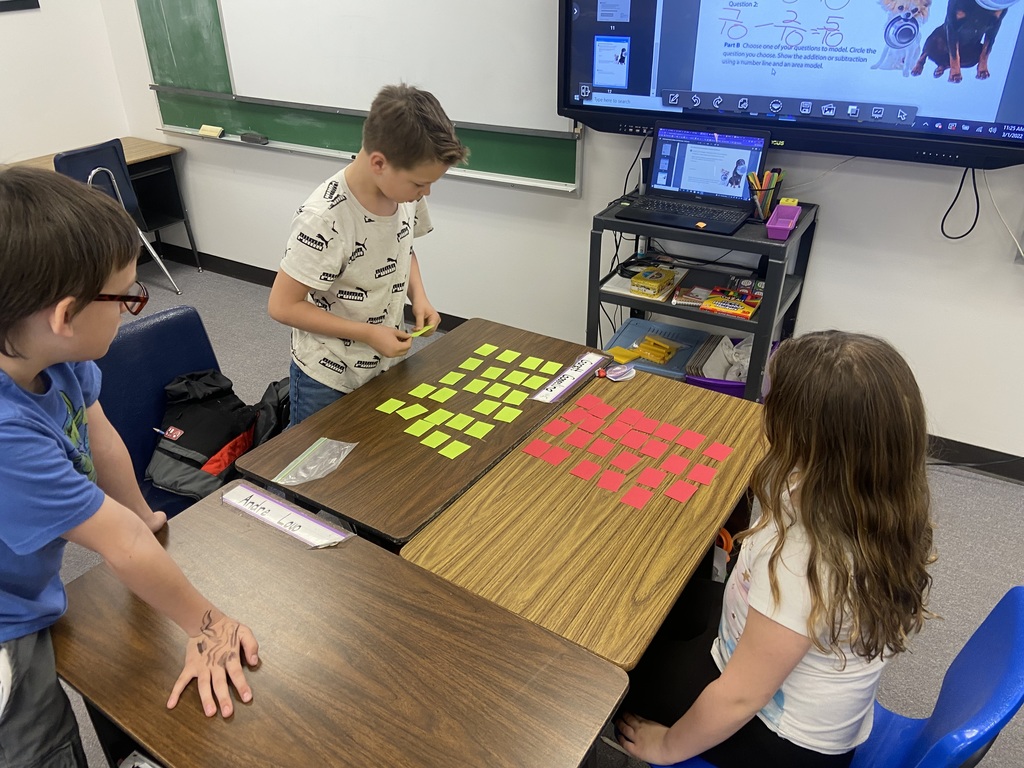 4th grade students playing fraction memory.
