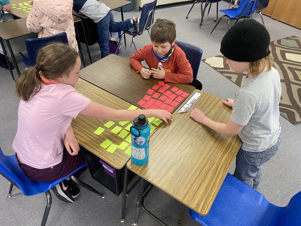 4th grade students playing fraction memory.