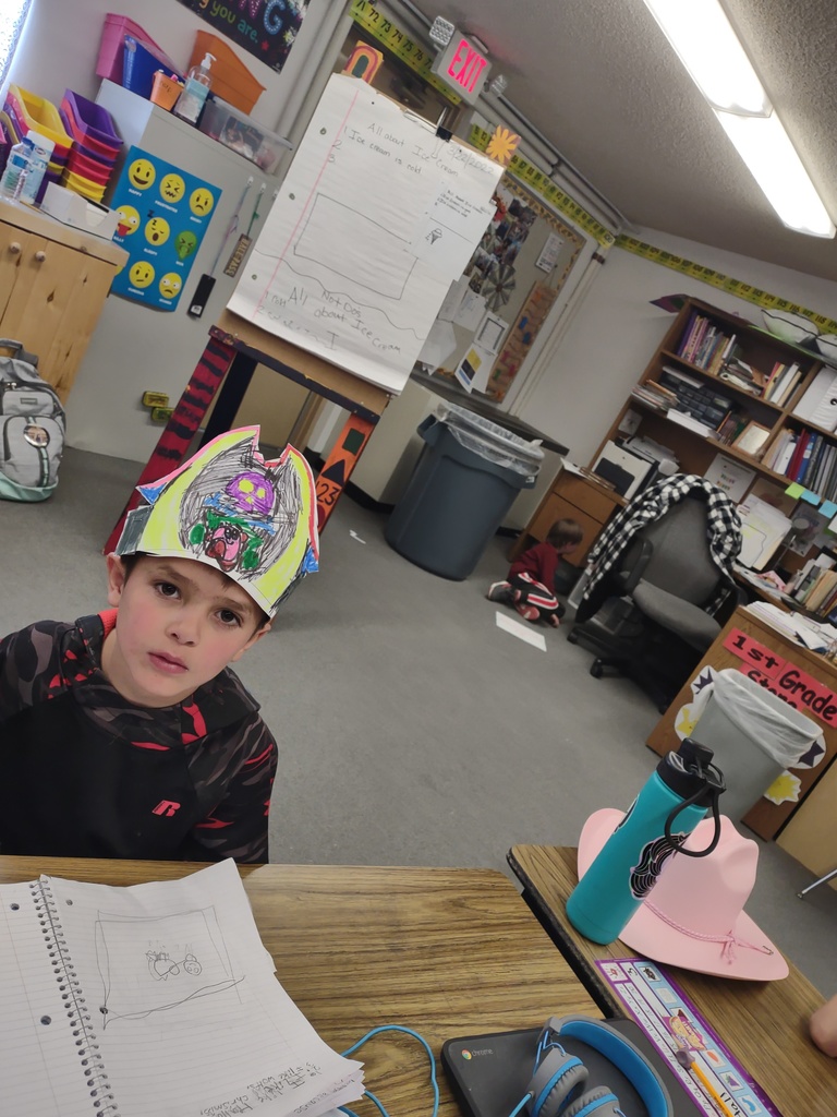First-grader showing off his new pirate hat. 