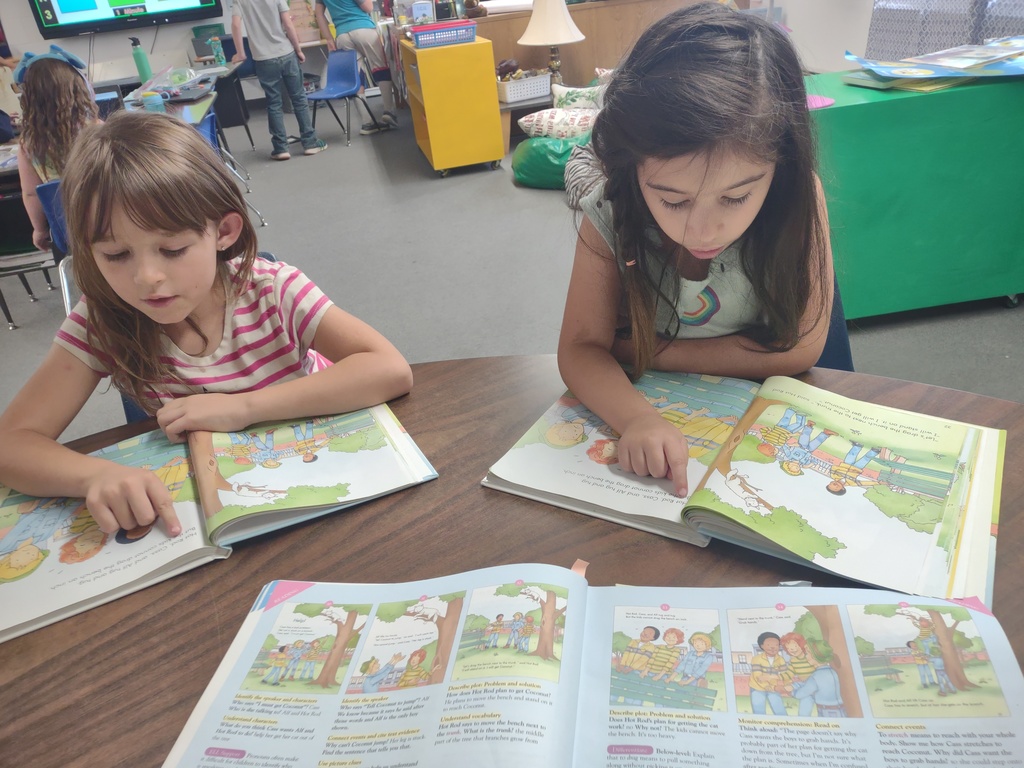 First-Grade students reading "Help!"