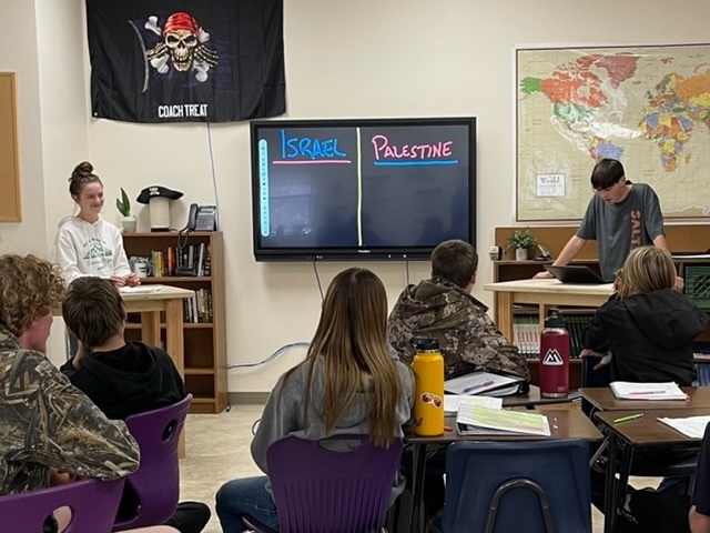 Geography students debate whether Israel or Palestine has more rights to their respective holy lands. Students were assigned to teams and researched current economic, religious, and geopolitical factors for each nation's rightful ownership. 